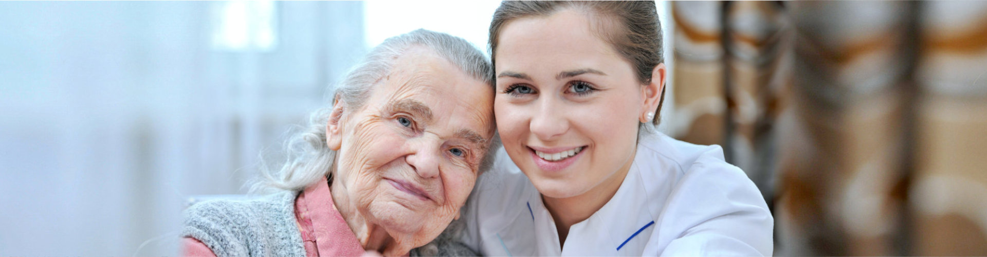 senior woman leaning at nurse